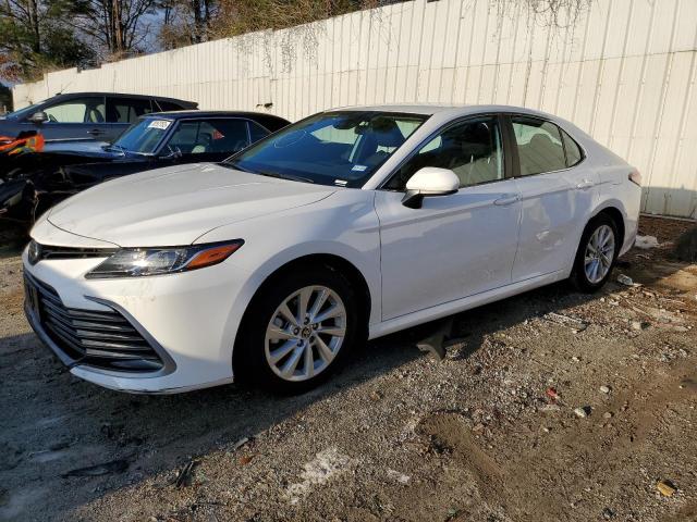TOYOTA CAMRY LE 2022 with VIN 4T1C11AK1NU667154 - Photo from auction