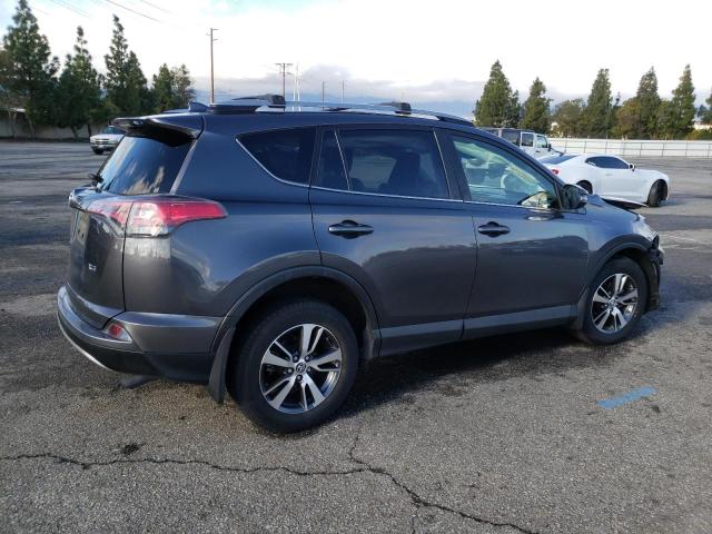 Photo 3 from auction – 2017 TOYOTA RAV4 XLE with VIN JTMWFREV2HJ122768