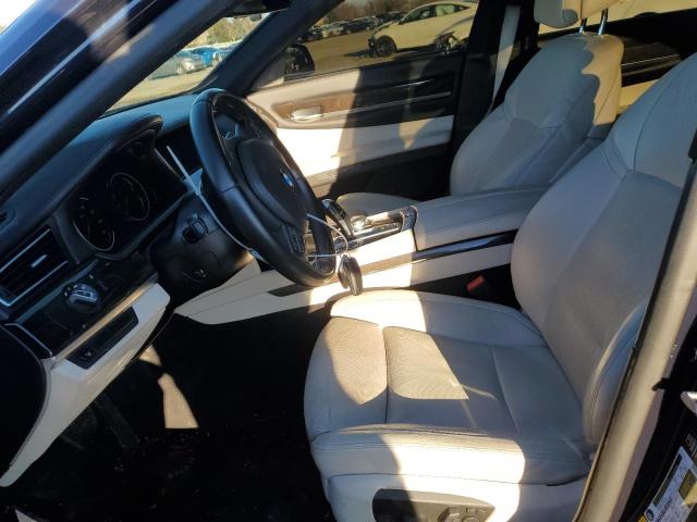 Photo 7 from auction – 2014 BMW 740 I with VIN WBAYA6C55ED144473