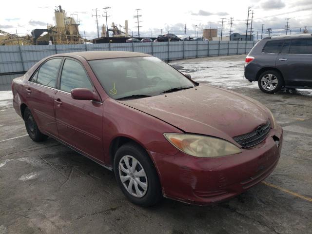 Photo 4 from auction – 2003 TOYOTA CAMRY LE with VIN JTDBE32K230178037
