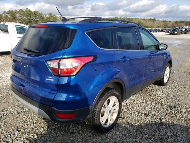 Photo 3 from auction – 2018 FORD ESCAPE SE with VIN 1FMCU0GD4JUB40665