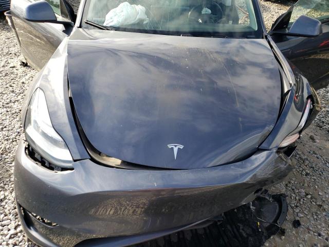 Photo 12 from auction – 2021 TESLA MODEL Y with VIN 5YJYGDEE3MF077236