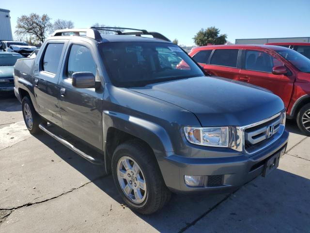 Photo 4 from auction – 2011 HONDA RIDGELINE with VIN 5FPYK1F4XBB452918