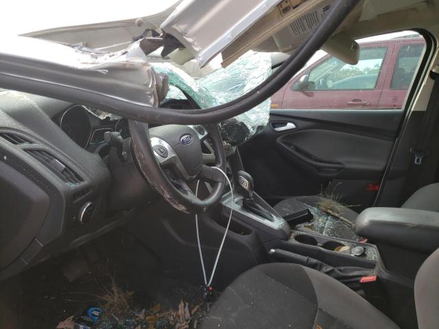 Foto 7 de la subasta – 2014 FORD FOCUS SE con VIN 1FADP3K25EL386262