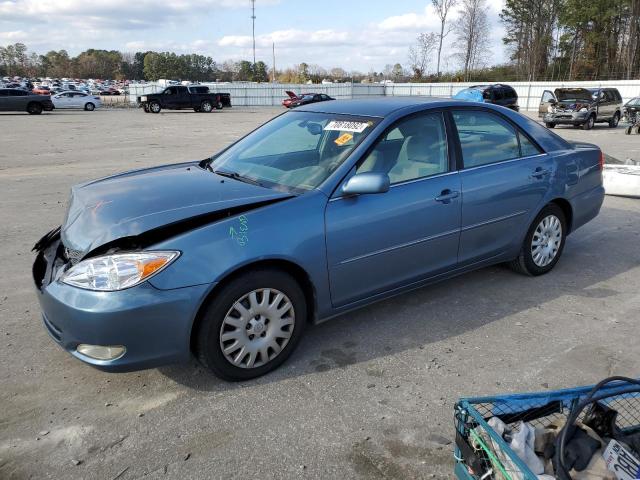 TOYOTA CAMRY LE 2003 with VIN 4T1BE30K53U713711 - Photo from auction