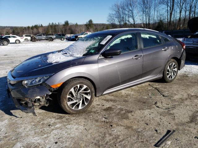 HONDA CIVIC EX 2018 with VIN 19XFC2F79JE000492 - Photo from auction