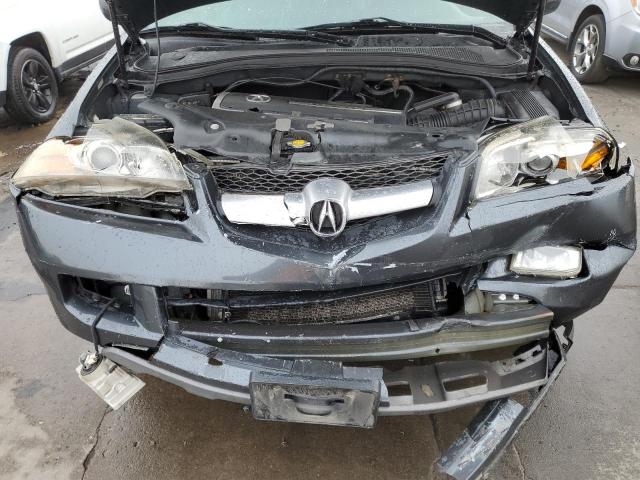 Photo 12 from auction – 2004 ACURA MDX TOURIN with VIN 2HNYD18924H555334