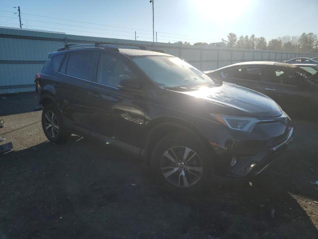 Photo 4 from auction – 2017 TOYOTA RAV4 XLE with VIN 2T3RFREV3HW661897