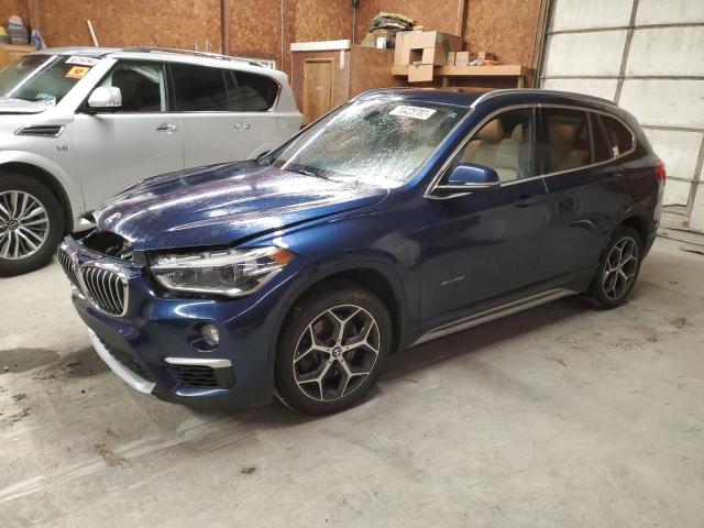 BMW X1 XDRIVE2 2017 with VIN WBXHT3C35H5F85017 - Photo from auction