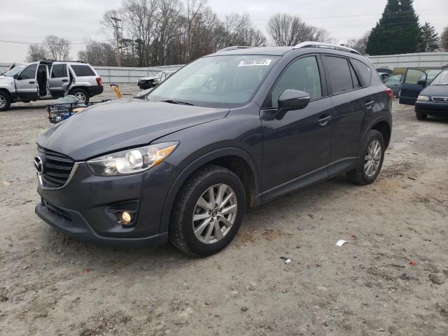 MAZDA CX-5 TOURI 2016 with VIN JM3KE4CY8G0789390 - Photo from auction