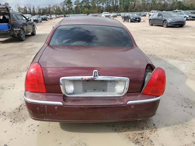 Photo 6 from auction – 2004 LINCOLN TOWN CAR E with VIN 1LNHM81W94Y607834