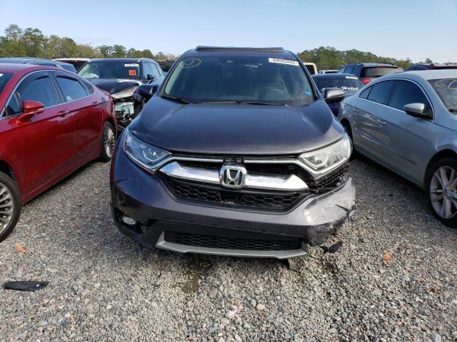 Photo 5 from auction – 2018 HONDA CR-V EX with VIN 7FARW1H52JE039952