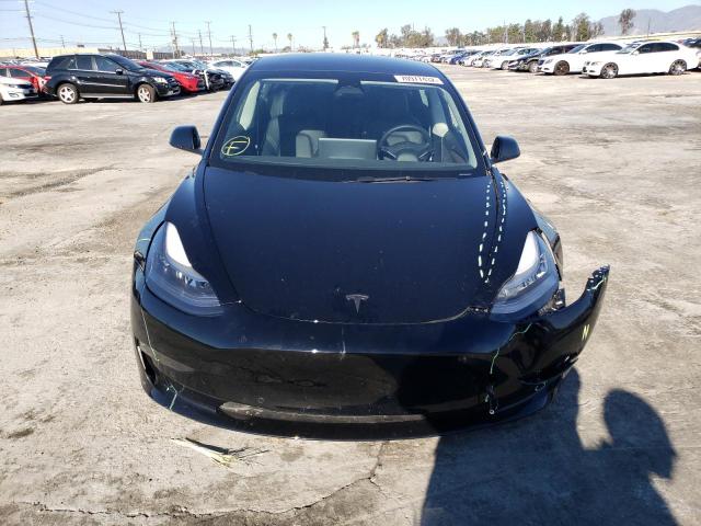 Photo 5 from auction – 2022 TESLA MODEL 3 with VIN 5YJ3E1EB7NF316275