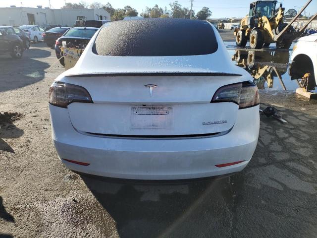 Photo 6 from auction – 2021 TESLA MODEL 3 with VIN 5YJ3E1EC9MF075889