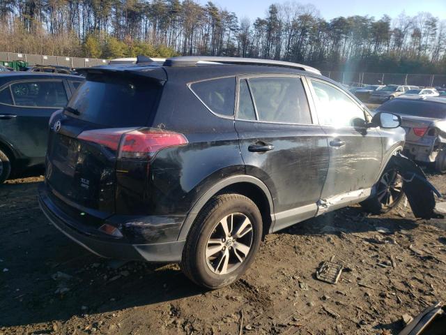 Photo 3 from auction – 2017 TOYOTA RAV4 XLE with VIN 2T3RFREV7HW577758