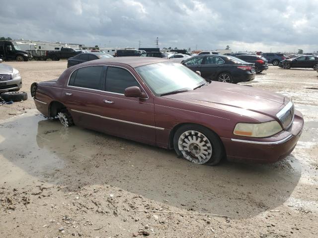 Photo 4 from auction – 2004 LINCOLN TOWN CAR E with VIN 1LNHM81W94Y607834