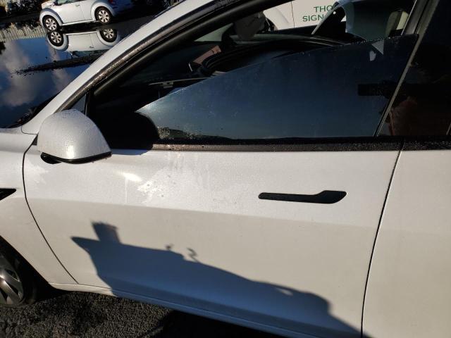 Photo 7 from auction – 2021 TESLA MODEL 3 with VIN 5YJ3E1EC9MF075889