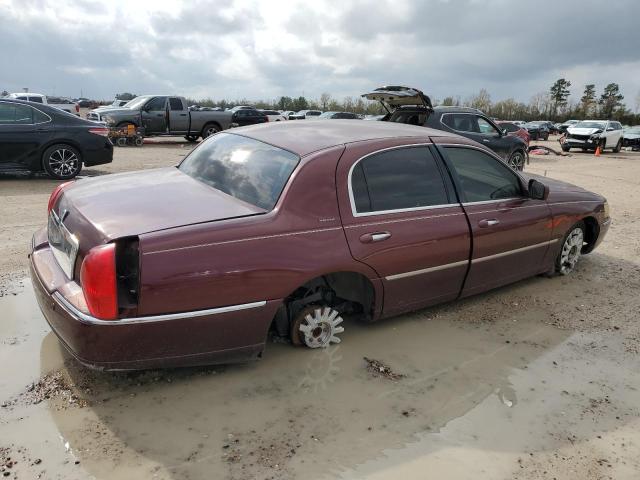 Photo 3 from auction – 2004 LINCOLN TOWN CAR E with VIN 1LNHM81W94Y607834