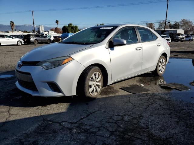 TOYOTA COROLLA L 2015 with VIN 2T1BURHE5FC338686 - Photo from auction