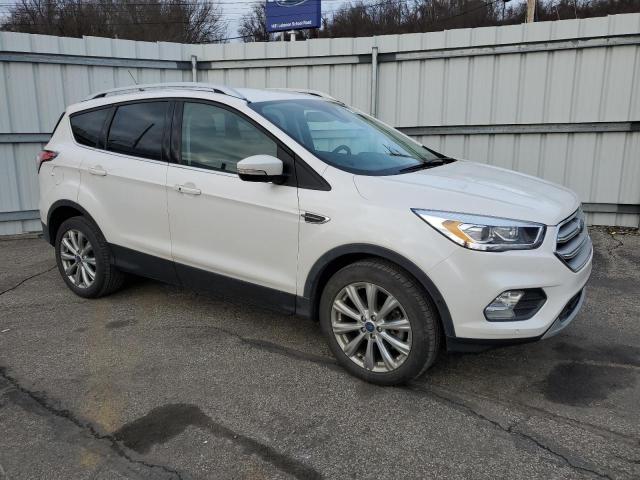 Photo 4 from auction – 2018 FORD ESCAPE TIT with VIN 1FMCU9J90JUD16569