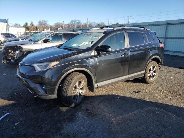 TOYOTA RAV4 XLE 2017 with VIN 2T3RFREV3HW661897 - Photo from auction