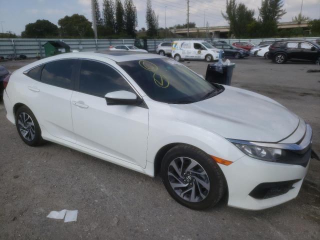 Photo 4 from auction – 2018 HONDA CIVIC EX with VIN 2HGFC2F79JH570451