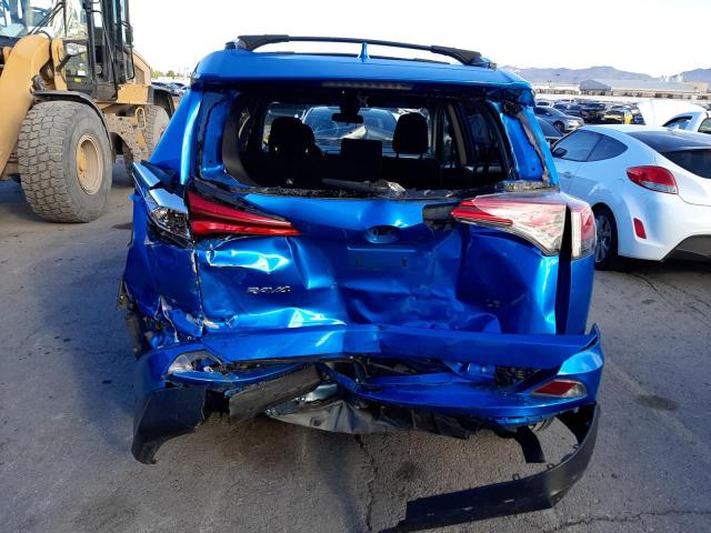 Photo 6 from auction – 2018 TOYOTA RAV4 LE with VIN JTMZFREV0JJ735538
