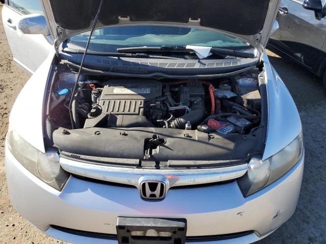 Photo 11 from auction – 2007 HONDA CIVIC HYBR with VIN JHMFA36247S001912