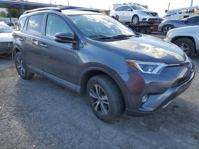Photo 4 from auction – 2016 TOYOTA RAV4 XLE with VIN JTMWFREV6GJ073623