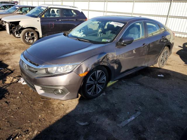 HONDA CIVIC EX 2017 with VIN 2HGFC1F31HH638341 - Photo from auction
