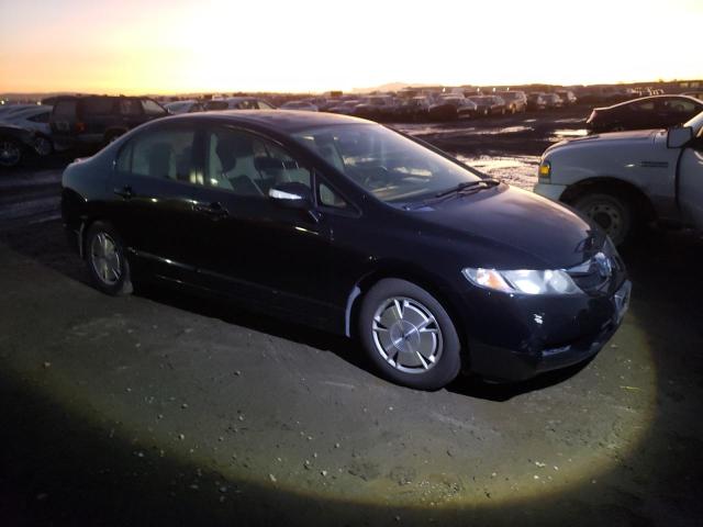Photo 4 from auction – 2010 HONDA CIVIC HYBR with VIN JHMFA3F22AS006629