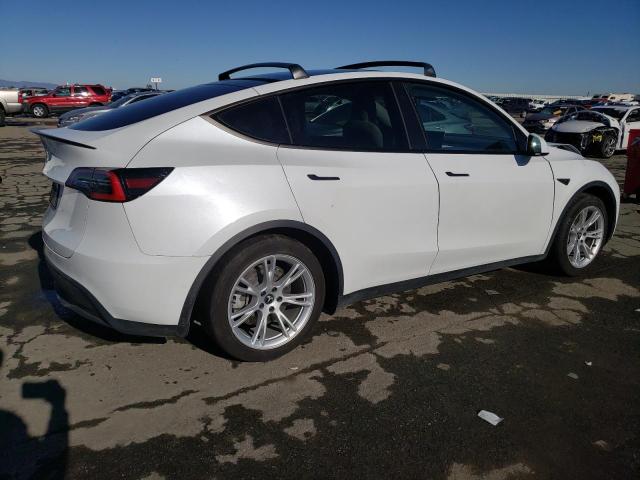 Photo 3 from auction – 2021 TESLA MODEL Y with VIN 5YJYGDED9MF107041