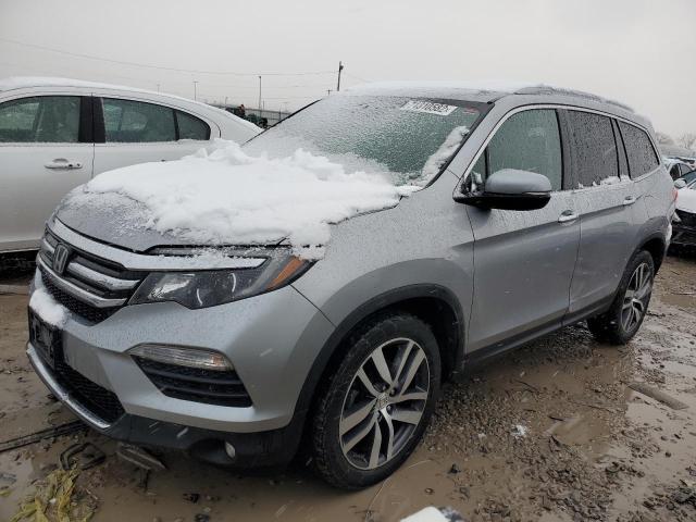 HONDA PILOT TOUR 2016 with VIN 5FNYF6H94GB123707 - Photo from auction