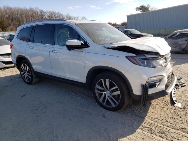 Photo 4 from auction – 2017 HONDA PILOT TOUR with VIN 5FNYF5H94HB023490