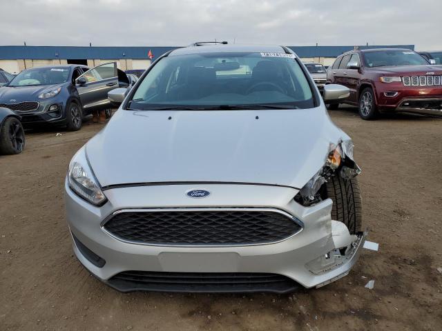Photo 5 from auction – 2016 FORD FOCUS SE with VIN 1FADP3F26GL215744