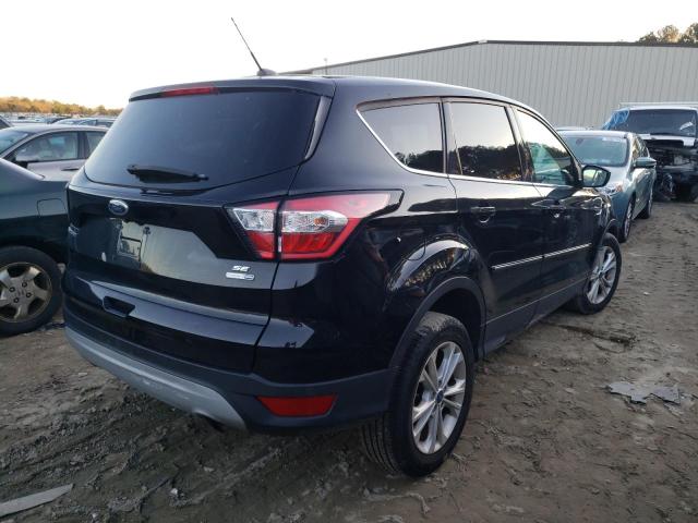 Photo 3 from auction – 2017 FORD ESCAPE SE with VIN 1FMCU9GD1HUD90220