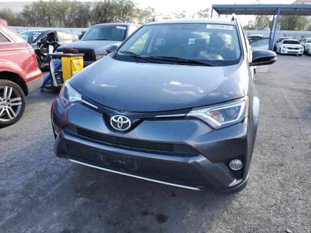Photo 5 from auction – 2016 TOYOTA RAV4 XLE with VIN JTMWFREV6GJ073623