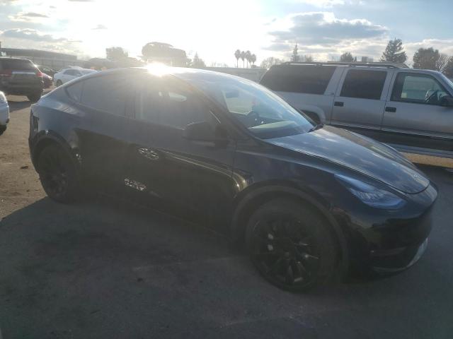 Photo 4 from auction – 2021 TESLA MODEL Y with VIN 5YJYGDED6MF110298