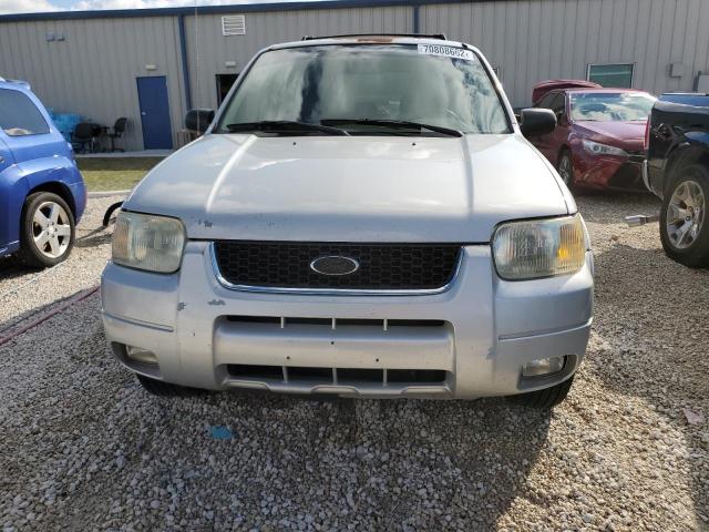 Photo 5 from auction – 2003 FORD ESCAPE LIM with VIN 1FMCU04173KB76519