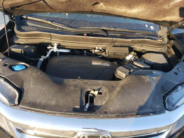 Photo 12 from auction – 2021 HONDA PILOT ELIT with VIN 5FNYF6H09MB009876