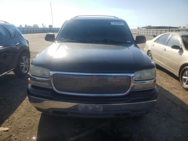 Photo 5 from auction – 2003 GMC YUKON with VIN 1GKEC13T13J334839
