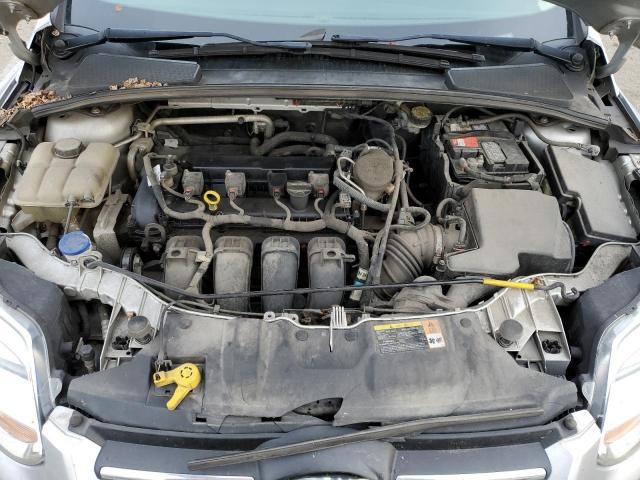 Photo 11 from auction – 2013 FORD FOCUS SE with VIN 1FADP3F29DL354200