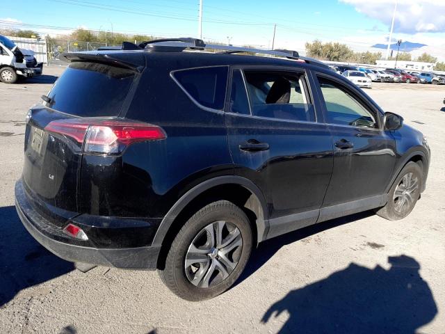Photo 3 from auction – 2018 TOYOTA RAV4 LE with VIN 2T3ZFREV8JW510639