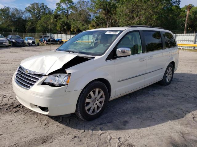 CHRYSLER TOWN & COU 2010 with VIN 2A4RR5DX1AR161735 - Photo from auction