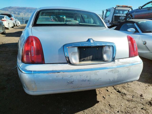 Photo 6 from auction – 2000 LINCOLN TOWN CAR E with VIN 1LNHM81W3YY821546