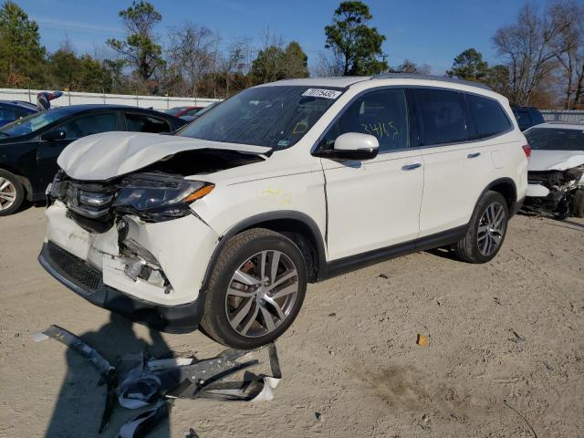 HONDA PILOT TOUR 2017 with VIN 5FNYF5H94HB023490 - Photo from auction