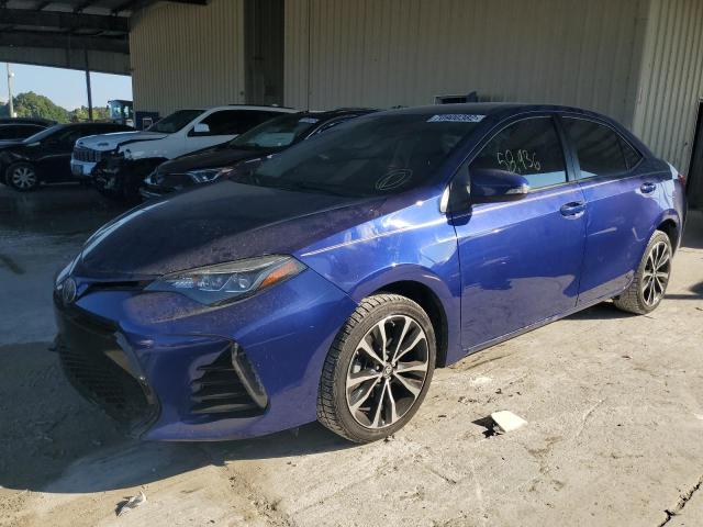 TOYOTA COROLLA L 2017 with VIN 5YFBURHEXHP648447 - Photo from auction