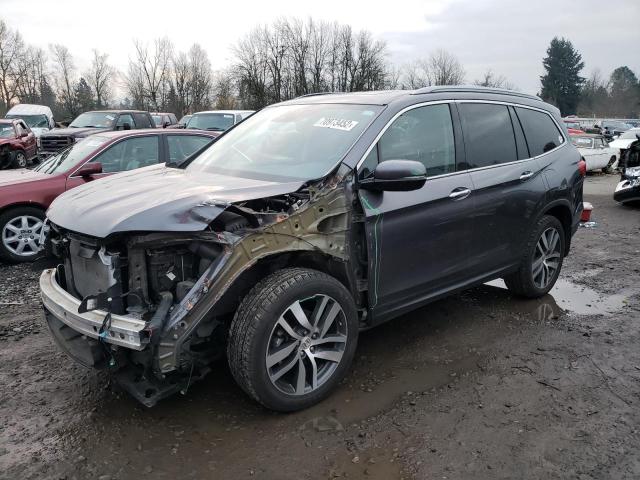HONDA PILOT TOUR 2017 with VIN 5FNYF6H95HB084644 - Photo from auction
