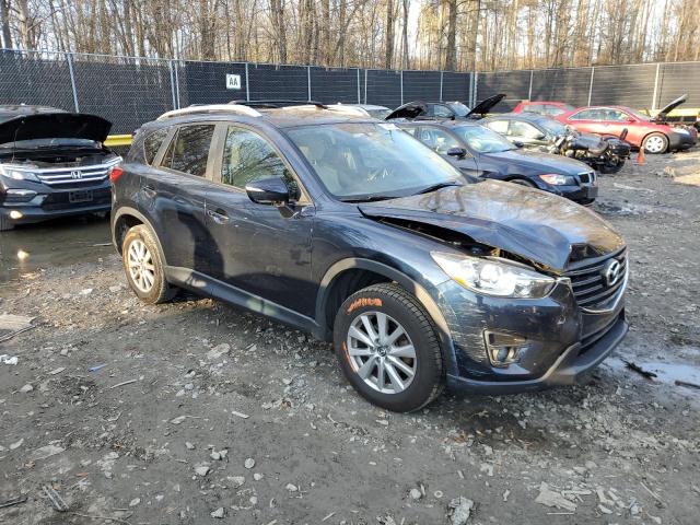 Photo 4 from auction – 2016 MAZDA CX-5 TOURI with VIN JM3KE4CY1G0809043