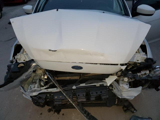 Photo 11 from auction – 2018 FORD FOCUS SE with VIN 1FADP3F25JL213040